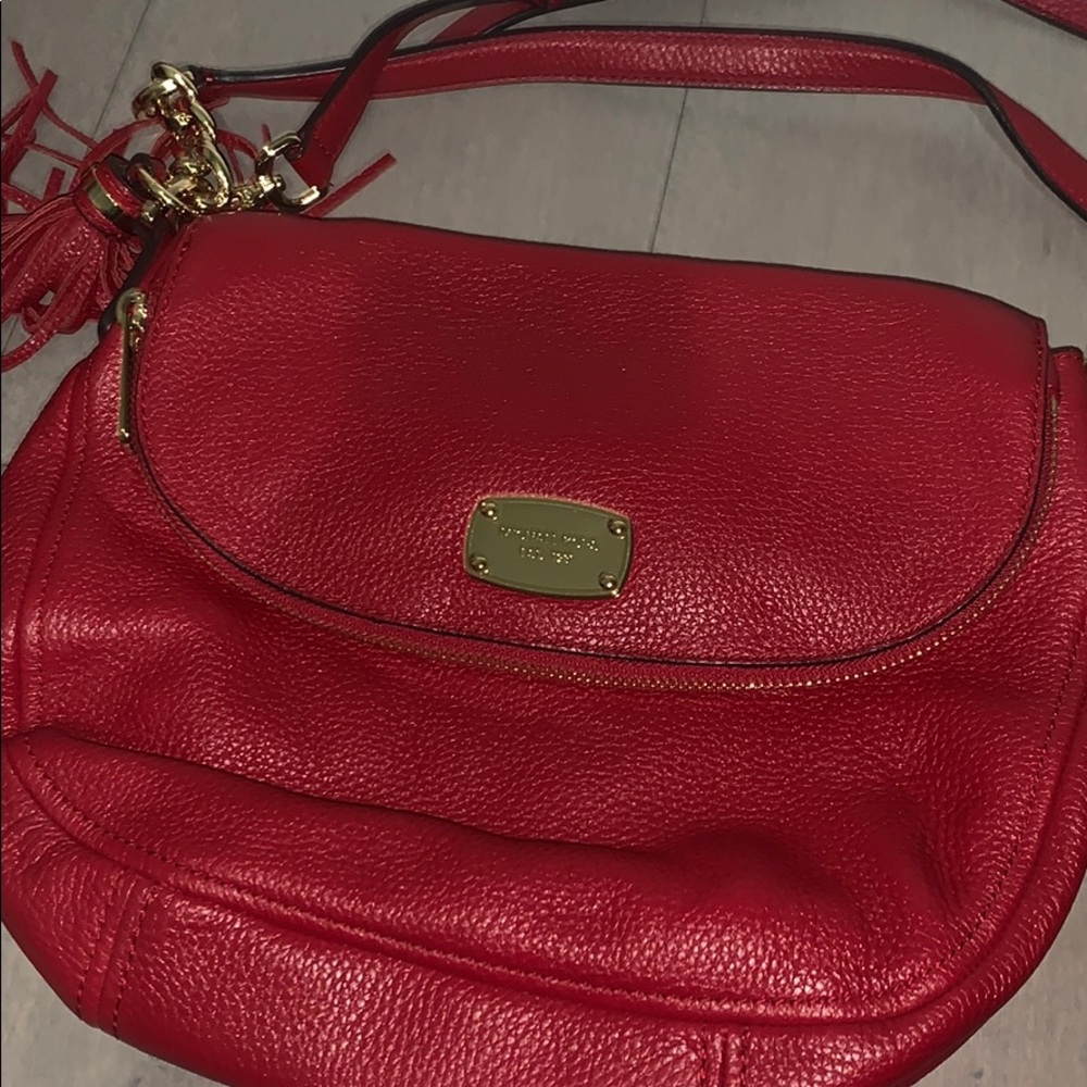 Red Micheal Kors satchel bag
